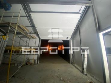 Промышленные секционные ворота Дорхан